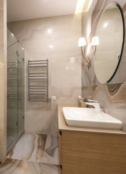 Interior of a Luxury Hotel Bathroom with Glass Shower Cabin